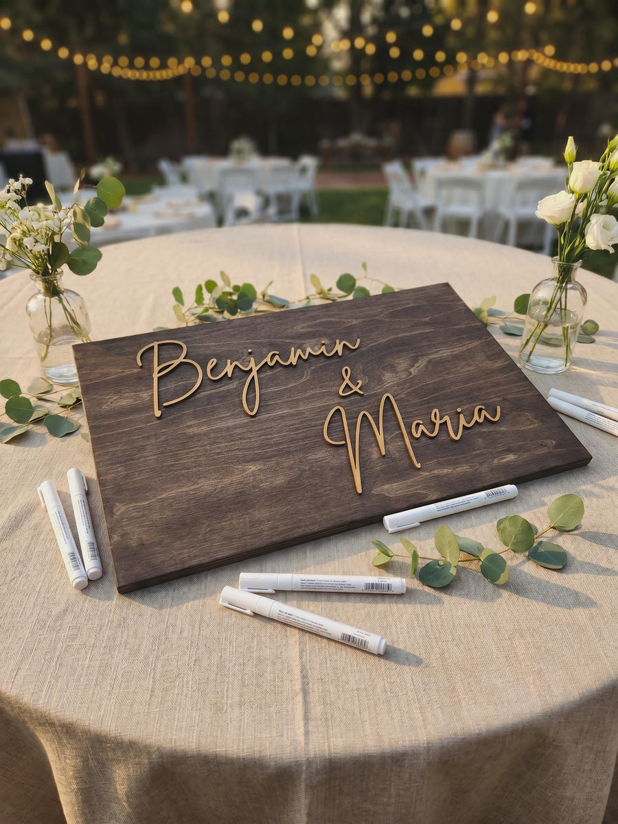 Wooden wedding signing board with the couple's first names in raised Metallic Bronze script and the date underneath, Jacobean finish.