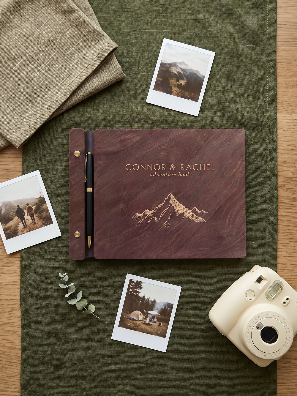 Adventure Book photo guest book with a Jacobean wood cover, vegan leather spine and screw posts