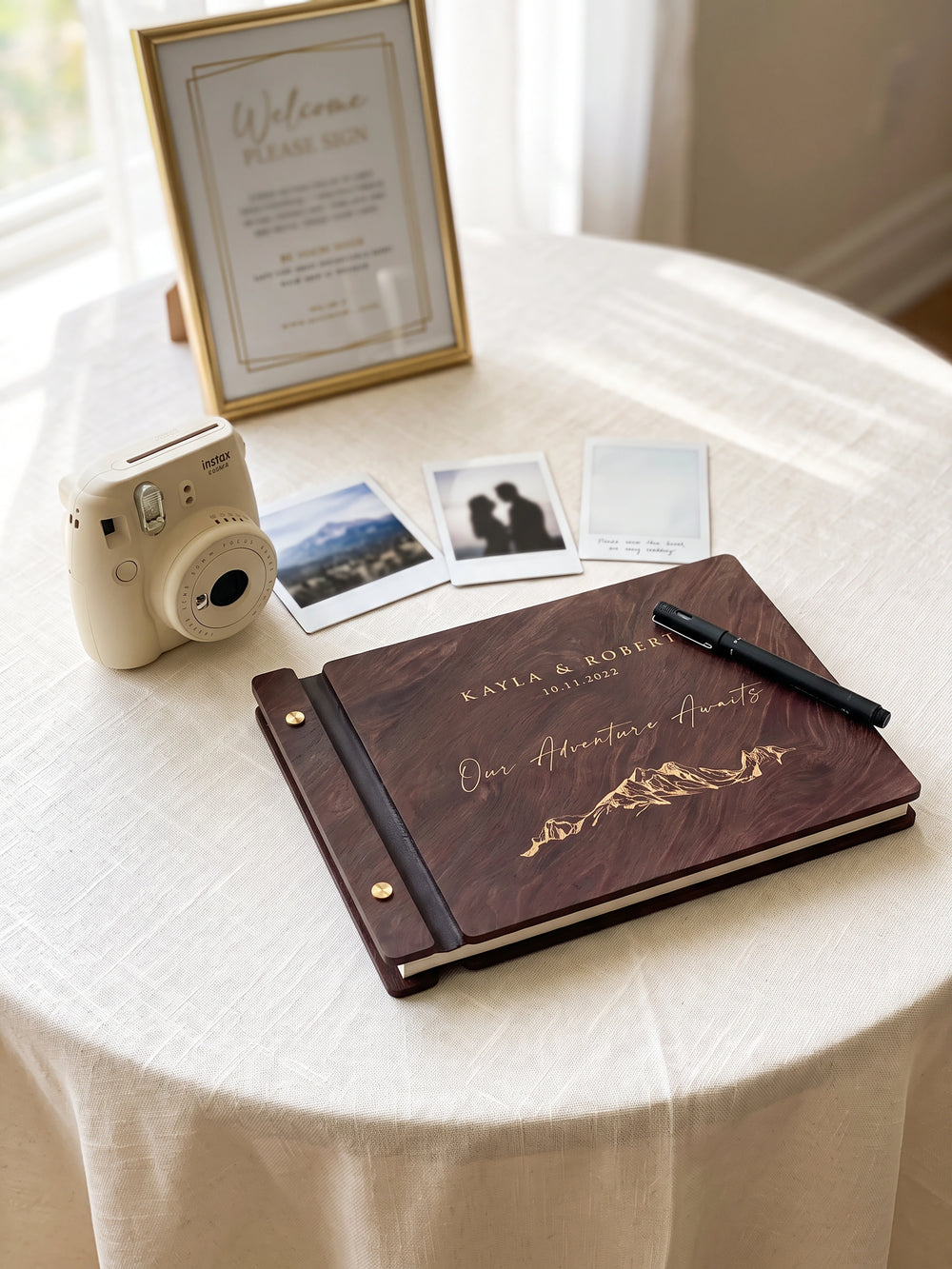 Our Adventure Awaits photo guest book with a Jacobean wood cover, vegan leather spine and screw posts