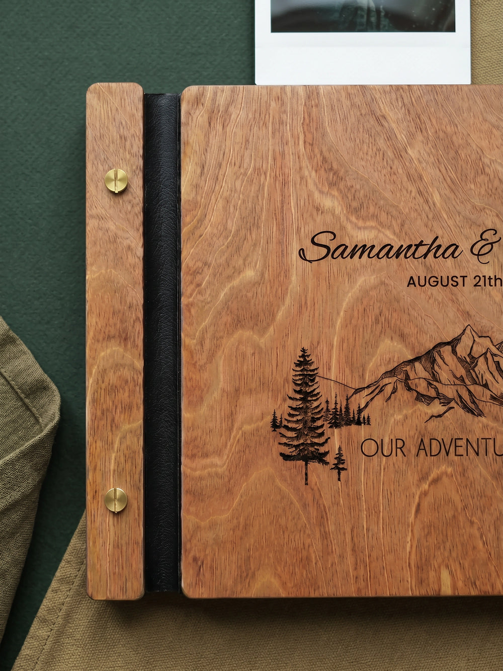 Our Adventure Begins photo guest book with a Hazelnut wood cover, vegan leather spine and screw posts