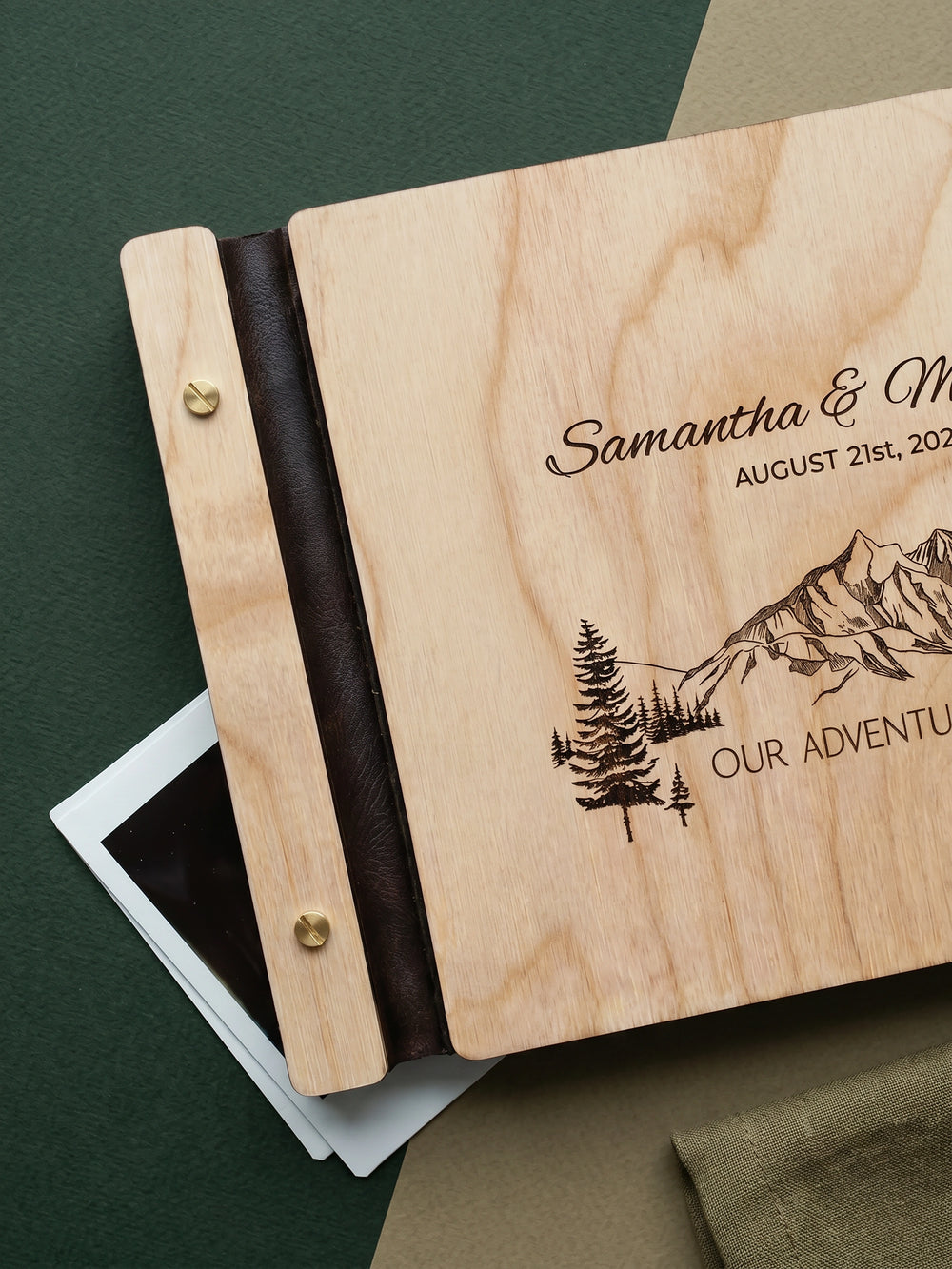 Our Adventure Begins photo guest book with a Natural wood cover, vegan leather spine and screw posts