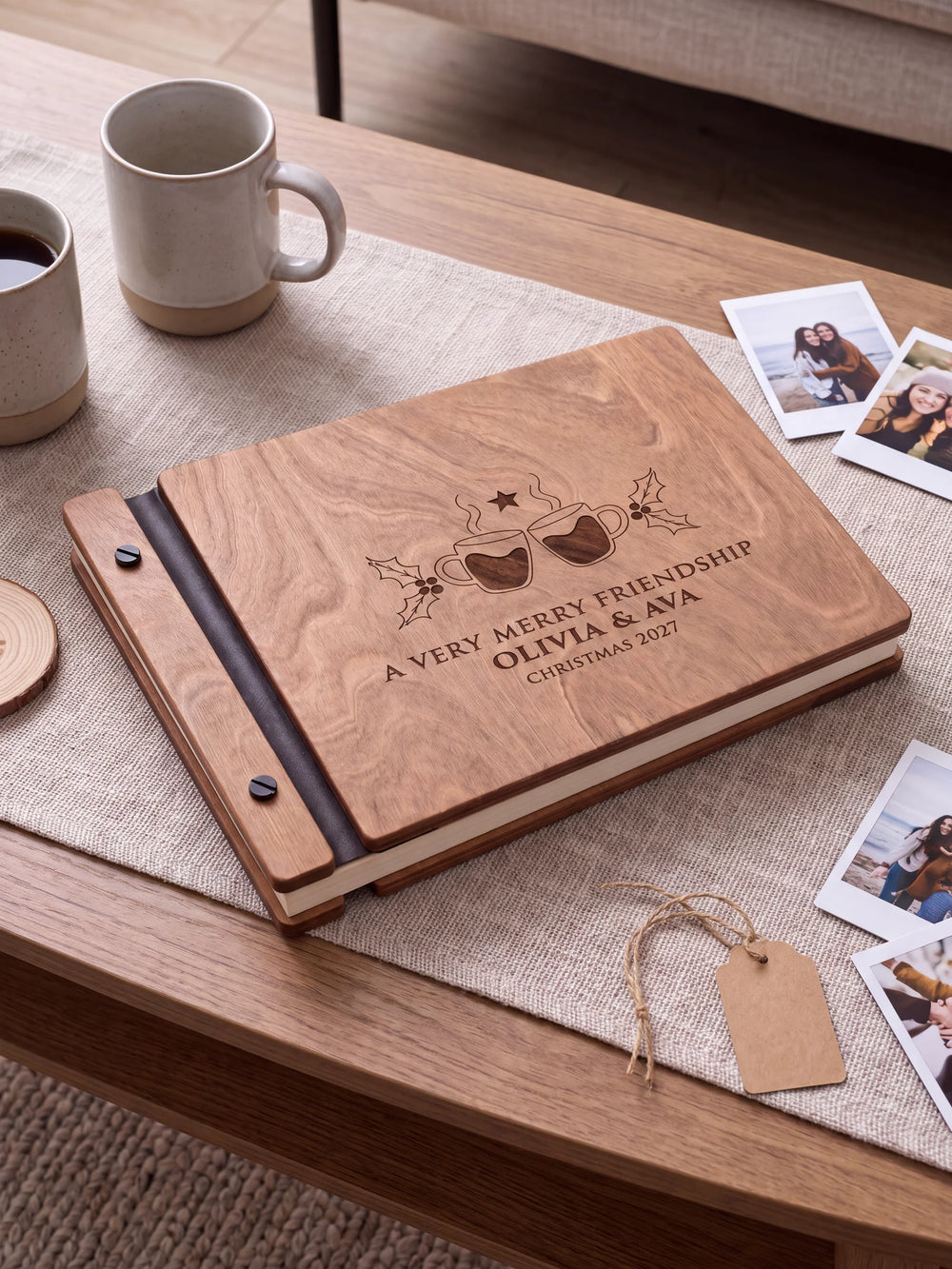 Close view of the Hazelnut album’s brown engraving, binding and black screw heads. Cream page edges and separate wooden cover sections are visible.