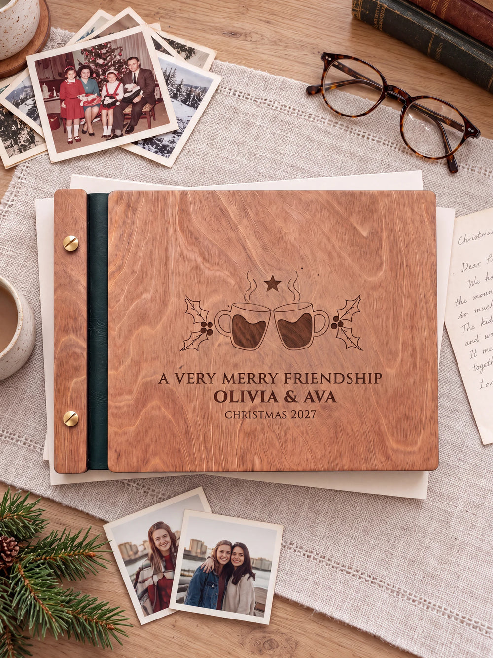 The full Hazelnut A VERY MERRY FRIENDSHIP album cover is shown close up. Brown engraved artwork, personalized wording, the narrow binding and gold screws are visible.