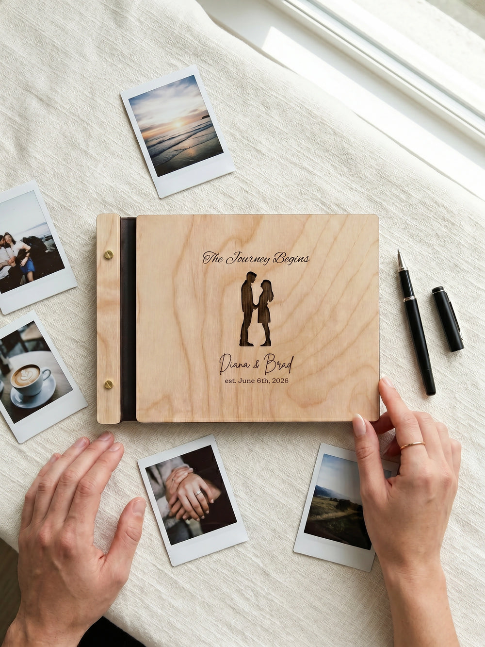 The Journey Begins photo guest book with a Natural wood cover, vegan leather spine and screw posts