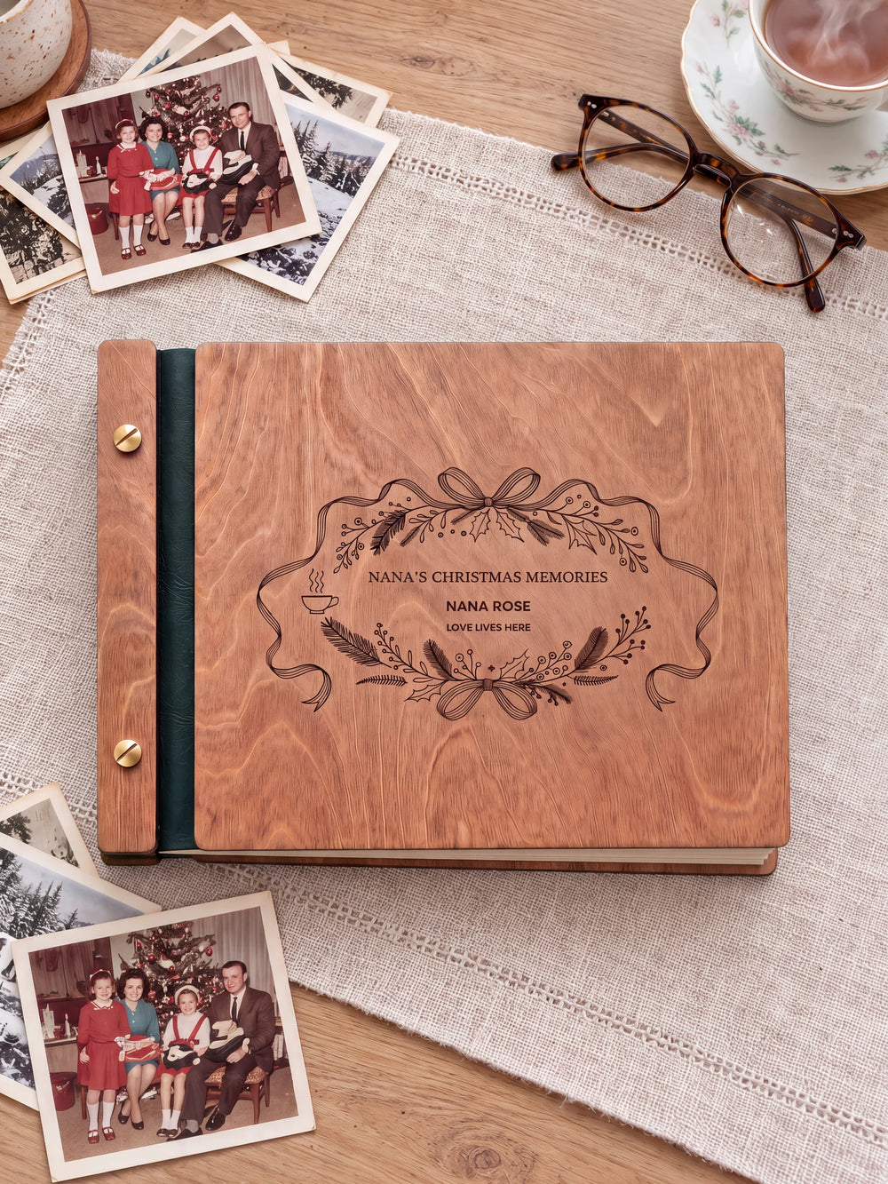 The full Hazelnut NANA’S CHRISTMAS MEMORIES album cover is shown close up. Brown engraved artwork, personalized wording, the narrow binding and gold screws are visible.
