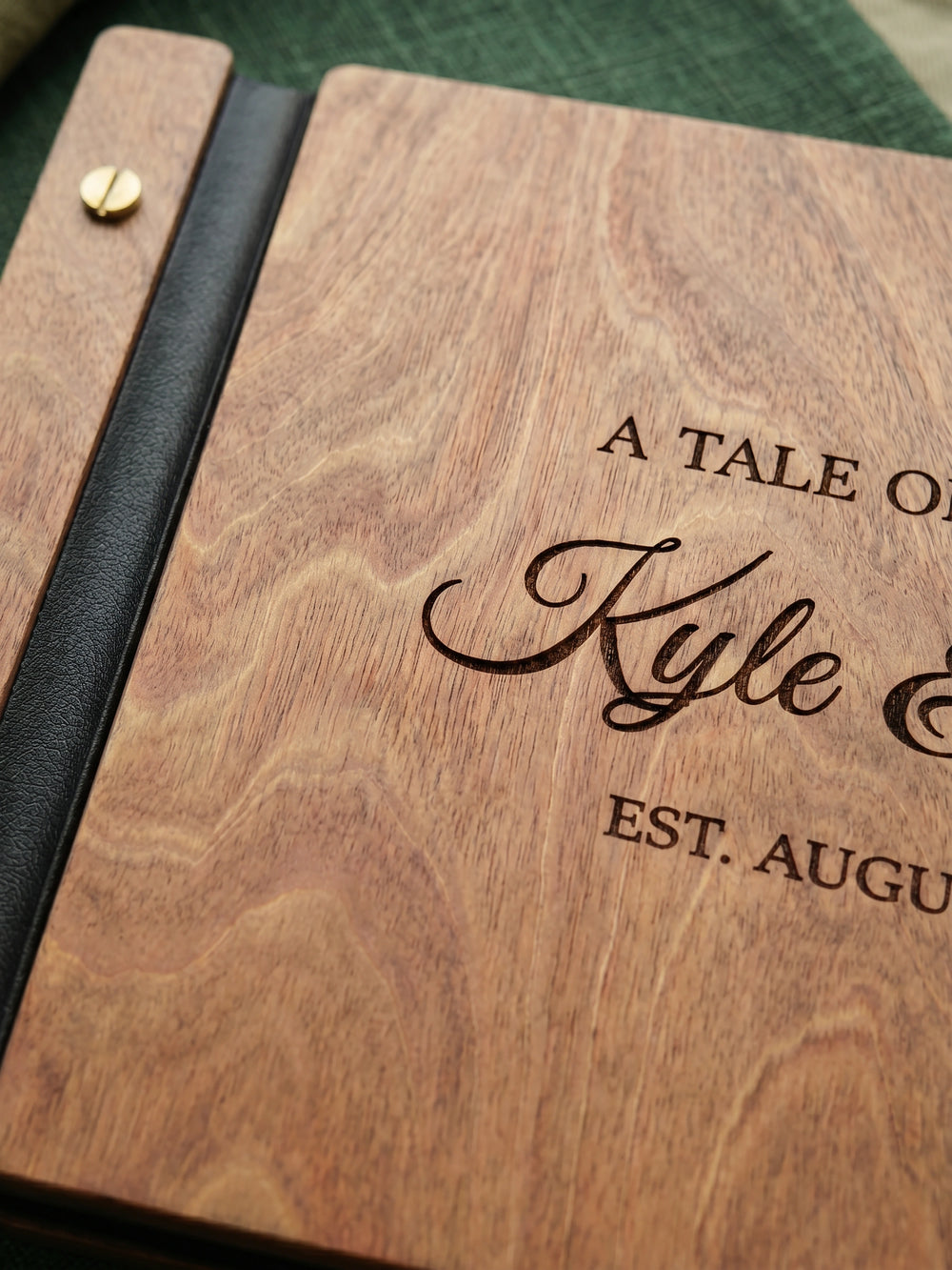 A Tale of Our Love photo guest book with a Hazelnut wood cover, vegan leather spine and screw posts
