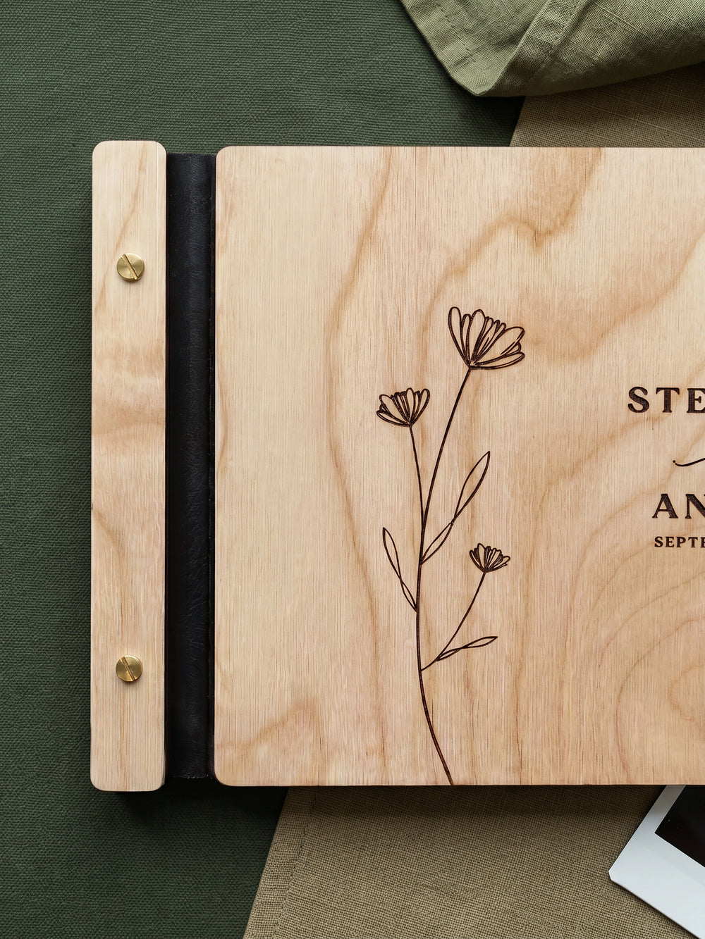 Wildflower wedding photo guest book with a Natural wood cover, vegan leather spine and screw posts