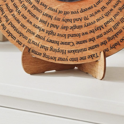 Song record standing on its wooden record stand