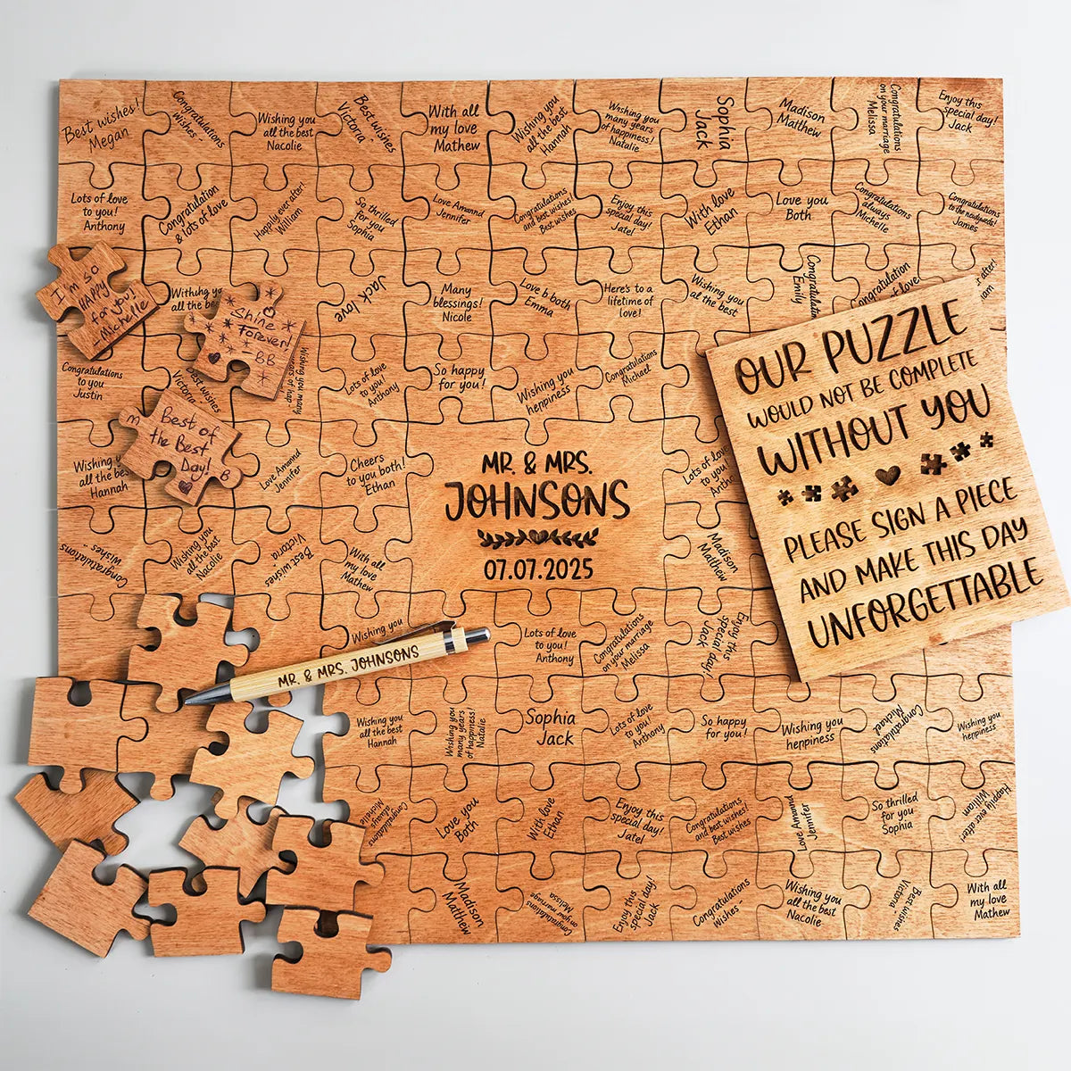 Wooden puzzle with personalized text and a sign asking for signatures, on a light gray background.